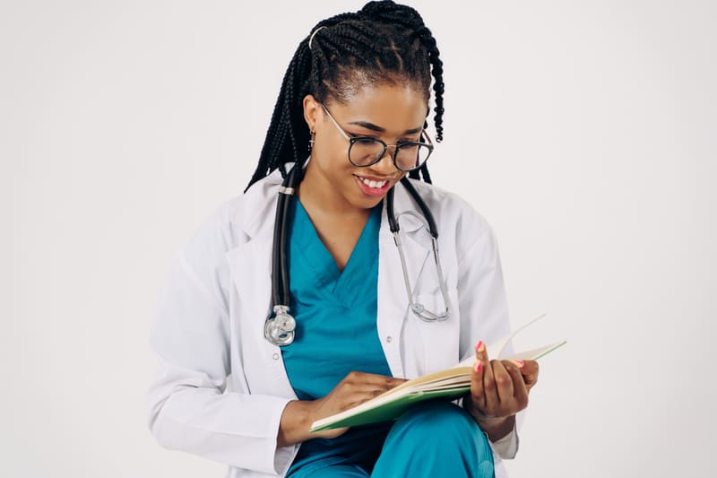 Healthcare professional reading clinical notes